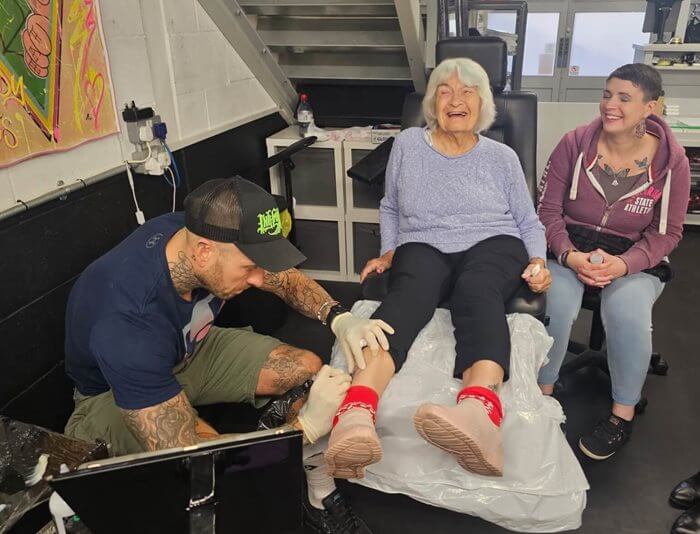 Pat becomes local tattoo shop’s oldest customer.
