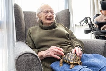 Making hiss-tory! Birmingham care home residents enjoy visit from all creatures great and small