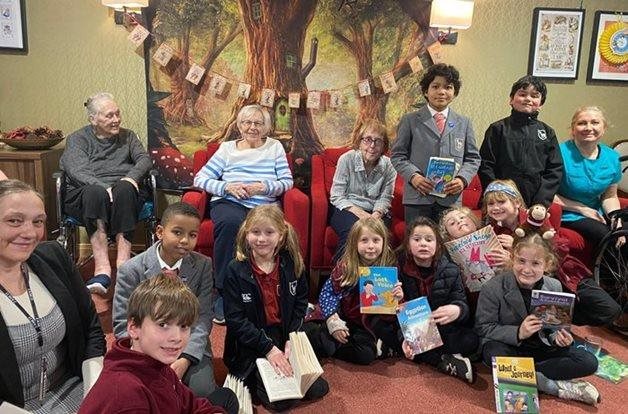 Kingston Vale care home residents read stories to local children for National Storytelling Week