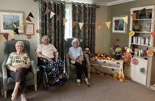 Sale care home residents and pupils join forces for Harvest Festival fun