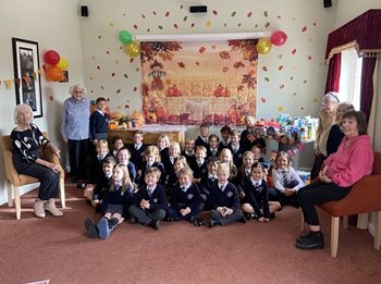 Stansted care home residents and school pupils join forces for Harvest Festival fun