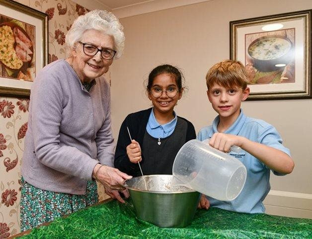 Worcester care home residents and school pupils join forces for Harvest Festival fun