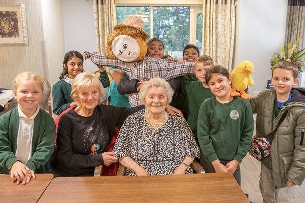 Bristol care home residents and pupils join forces for Harvest Festival fun