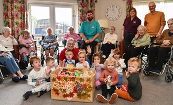 Bromsgrove care home residents and school pupils join forces for Harvest Festival fun