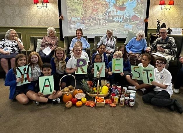 Bracknell care home residents and pupils join forces for Harvest Festival fun