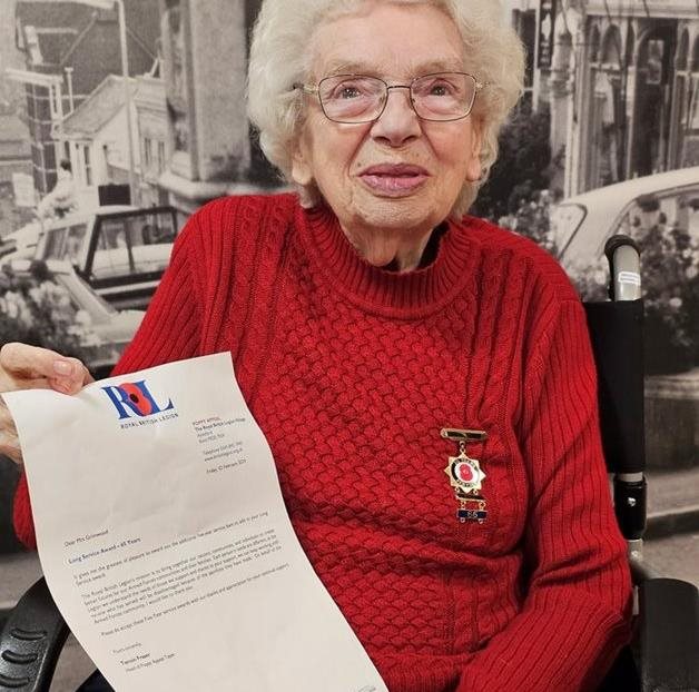 Essex care home resident receives award for 65 years of selling poppies