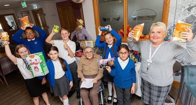 Kidderminster care home residents and pupils join forces for Harvest Festival fun