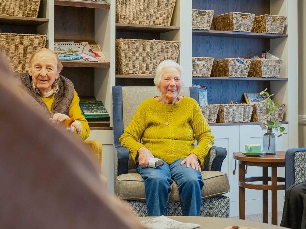 Cranford Grange - Cranford Grange resident in activities room