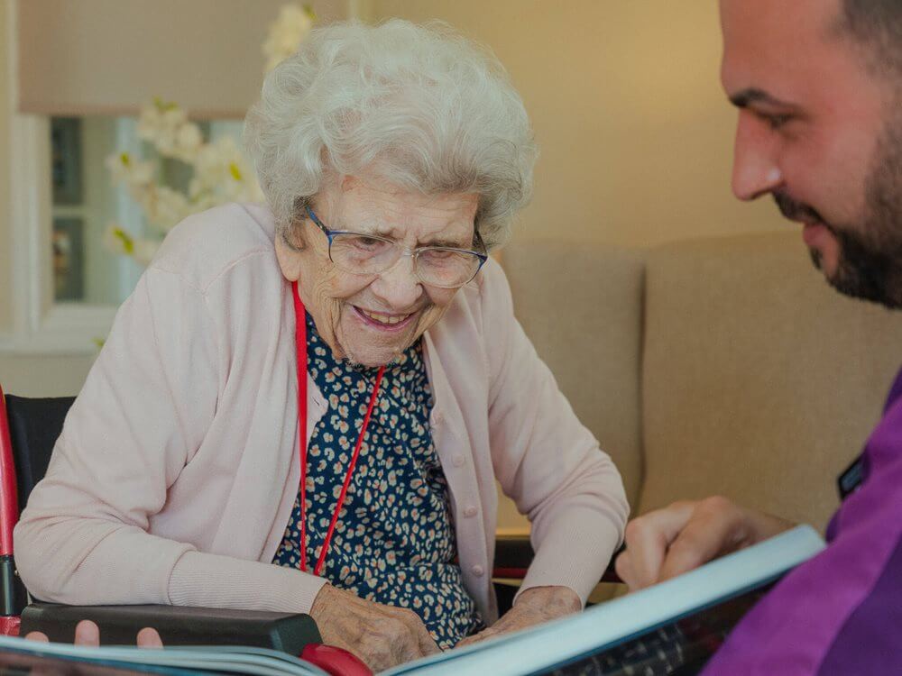 Queen's Court - Queen's Court resident and carer life story book