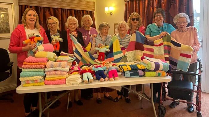 Residents at Ambleside create blankets, hats and teddy bears to be sent to their local baby bank